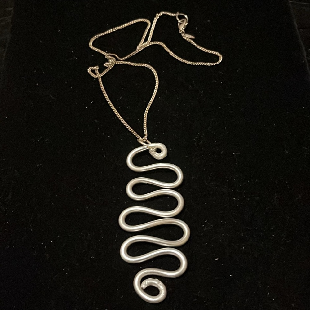 Elegant Silver Wave Hand Design Necklace - Picture 7 of 17